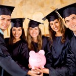 Graduate students holding a piggybank with education savings